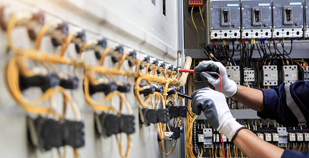 Professional Electrician technician working in Clayton, DE